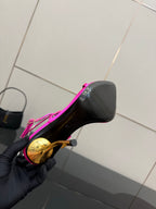 Womens YSL stiletto heel underside, black sole and gold-tone heel