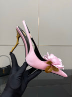 YSL ladies pink slingback heel with pink flower detail and gold stiletto