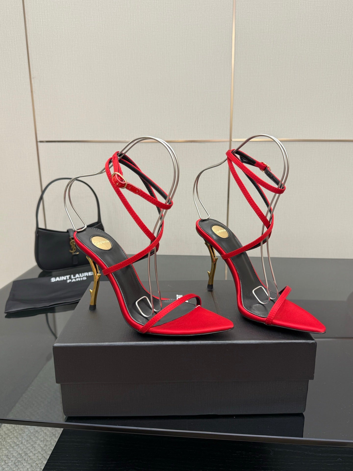 YSL ladies stiletto sandals with red toe and black straps, gold high heel, ankle laces