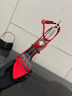 YSL ladies red heeled sandal with black trim, open toe, crisscross ankle straps