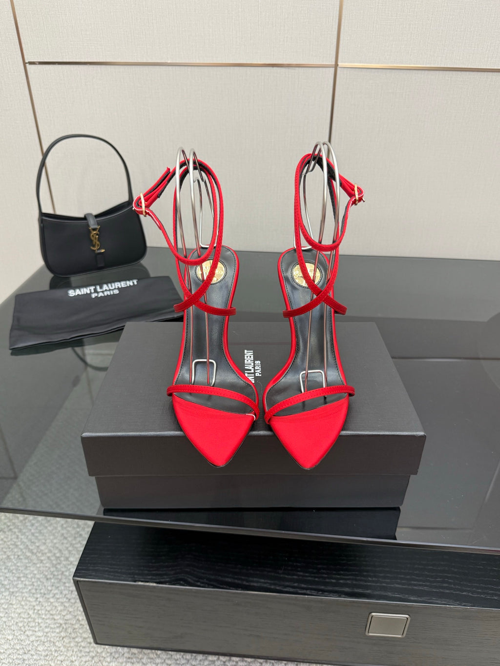 YSL ladies red pointed-toe heeled sandals with black straps and gold slim stiletto heels