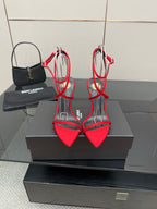 YSL ladies red pointed-toe heeled sandals with black straps and gold slim stiletto heels