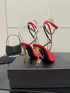 YSL ladies red and black strappy sandals with gold stiletto heels and lace-up ankle straps