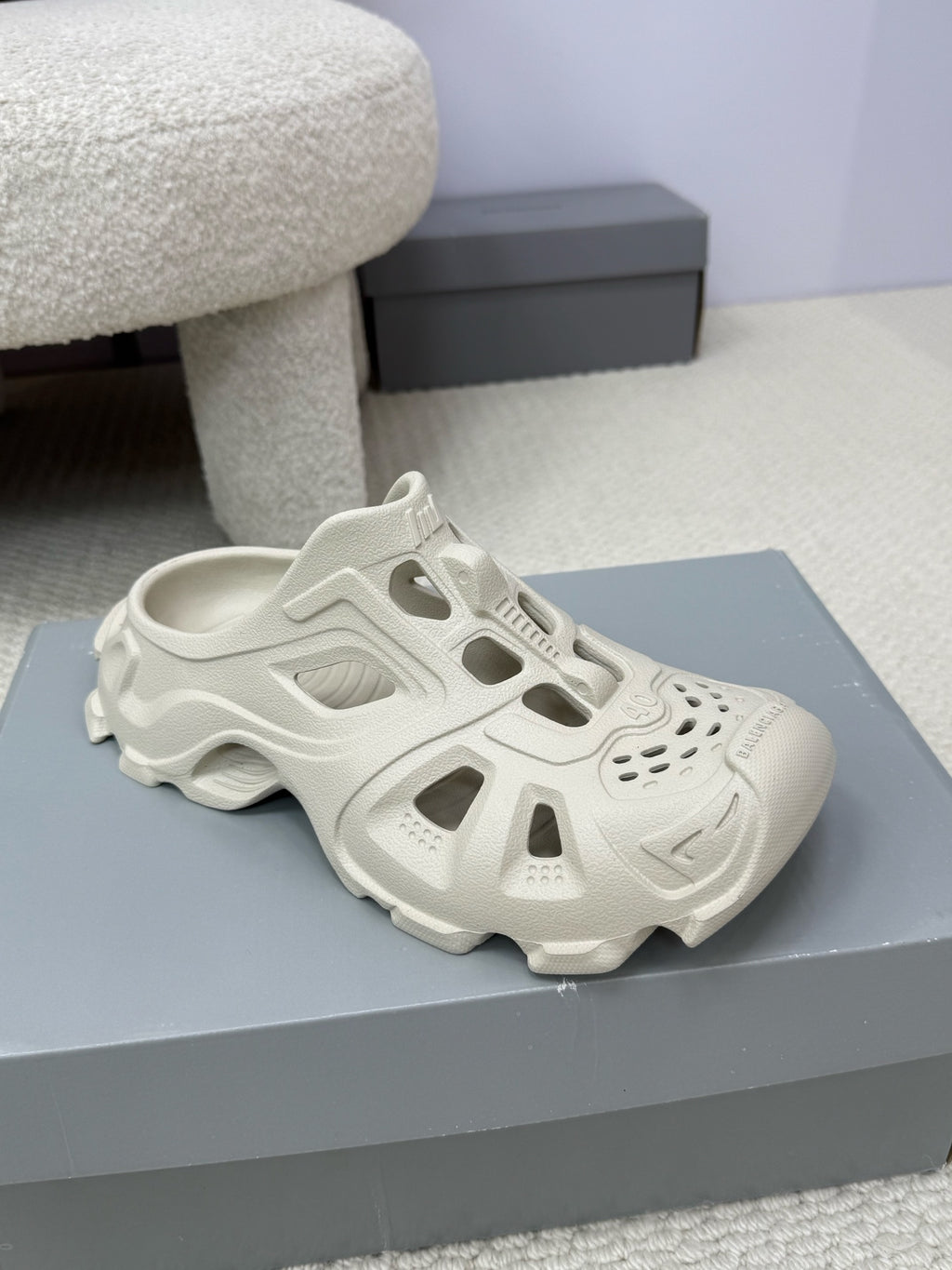 Balenciaga white sculpted slide sandals, side cutouts and treaded sole
