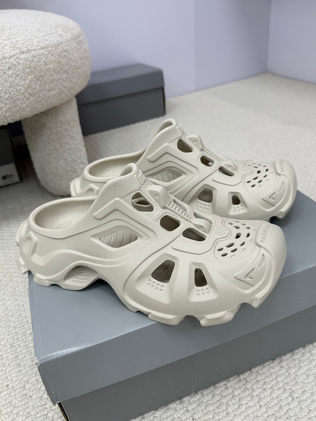Balenciaga white slide sandals pair, chunky tread sole and cutout design