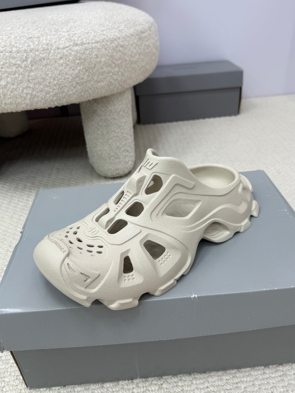 Balenciaga white slide sandals with perforated toe and openwork panels