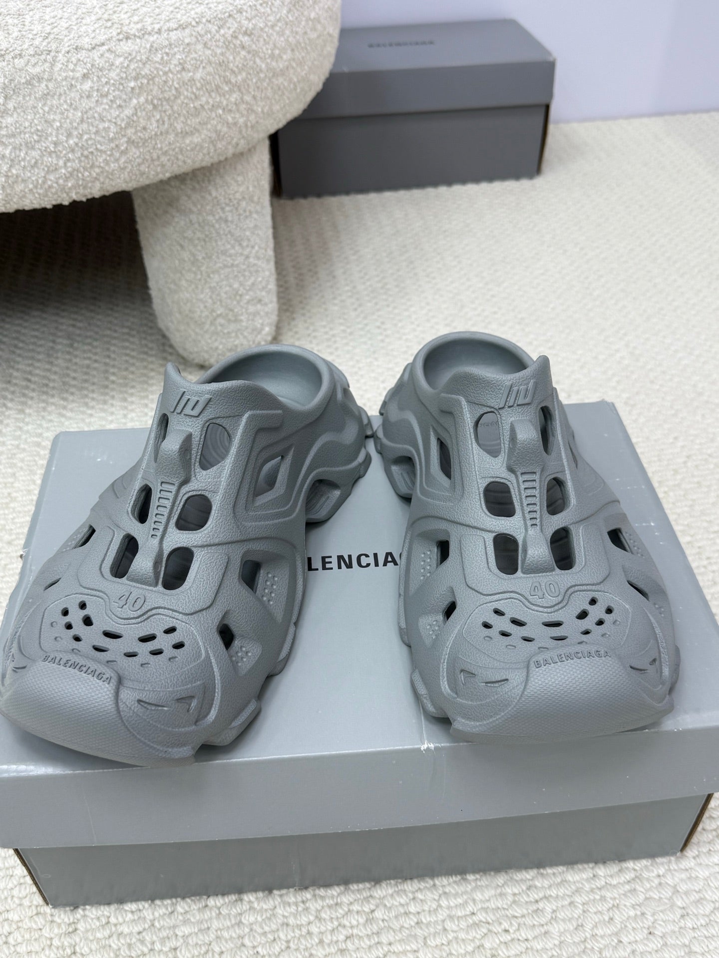 Balenciaga gray slide sandals with cutout upper, perforated toe, and chunky sole