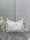 White quilted hobo shoulder bag with gold-tone hardware and two top handles