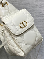 White quilted flap shoulder bag with gold CD-style emblem and top clasp