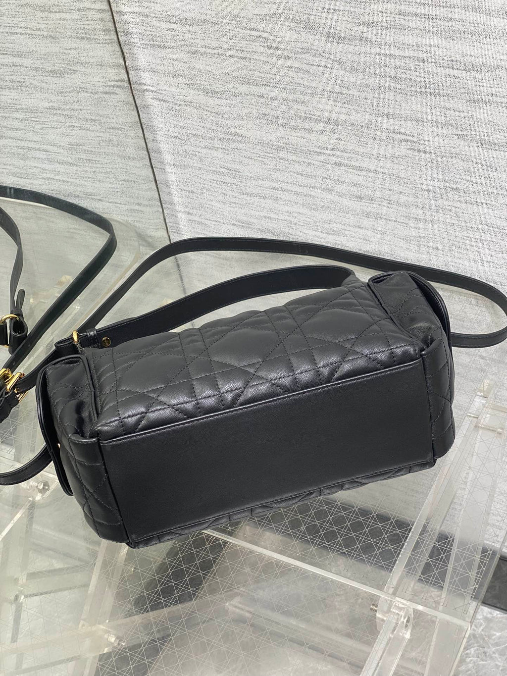 Dior bag, black quilted mini shoulder bag with long strap and zip-top closure