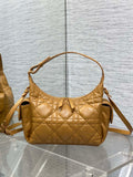 Dior quilted leather shoulder bag with top handle and crossbody strap, gold hardware