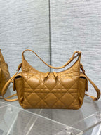 Dior quilted leather shoulder bag with two side tabs and detachable strap