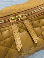 Dior quilted leather bag with gold-tone zipper and D-ring detail