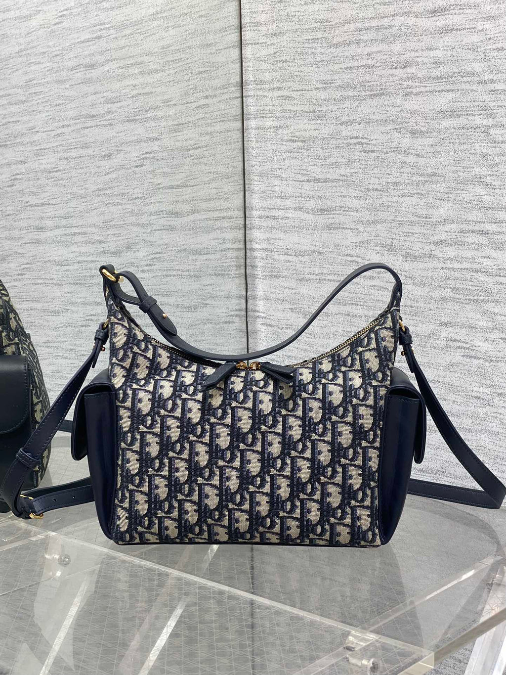 Dior hobo shoulder bag with curved top handle, navy leather trim and Dior Oblique canvas