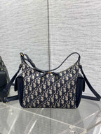 Dior hobo shoulder bag with curved top handle, navy leather trim and Dior Oblique canvas