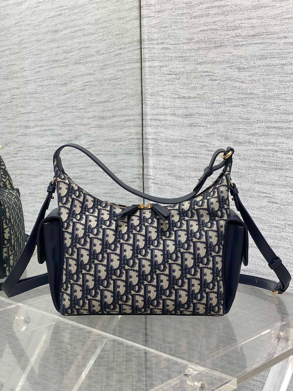 Dior hobo shoulder bag with navy leather shoulder strap and Dior Oblique canvas body