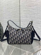Dior hobo shoulder bag with navy leather shoulder strap and Dior Oblique canvas body
