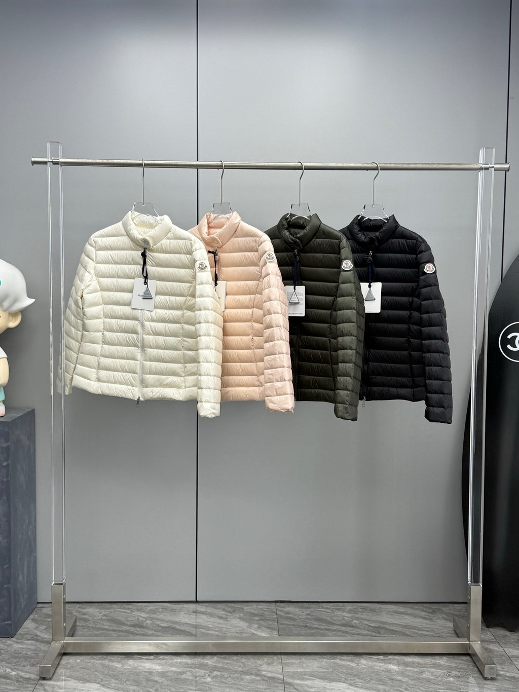 Moncler puffer jacket in light color, hooded with front zipper, quilted puffer baffles