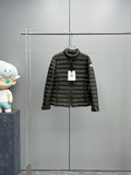 Dark puffer jacket with full zipper and stand collar.