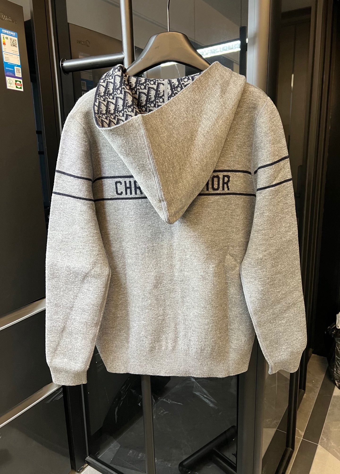 Long cardigan hoodie in heather gray with black stripe and logo lettering