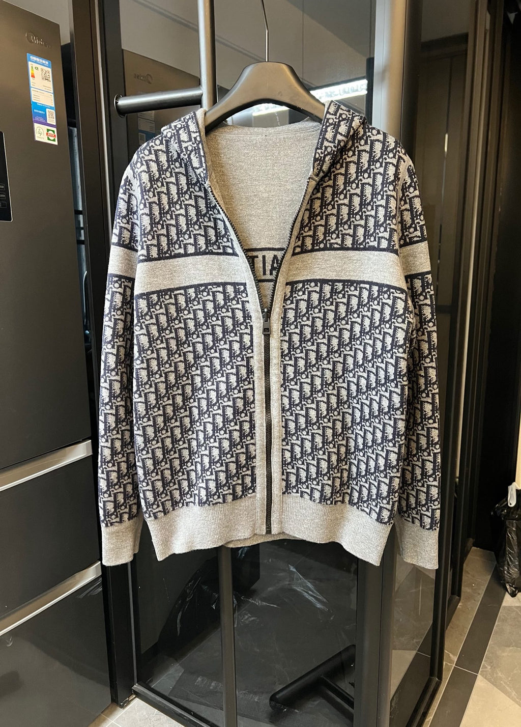 Dior long cardigan with monochrome knit logo pattern and hood, zip front