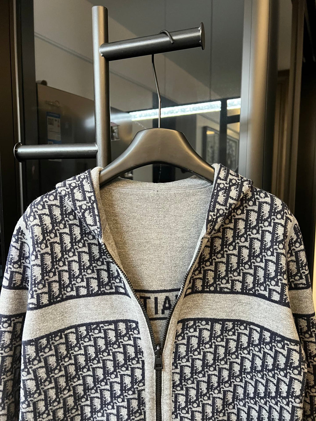 Dior logo knit long cardigan with contrast hood and zip front, close-up