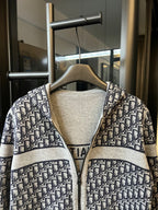 Dior logo knit long cardigan with contrast hood and zip front, close-up