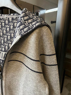 Long cardigan sleeve with black logo stripe and heather gray knit