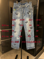 Light wash denim jeans with butterfly patches, with size measurements text overlay