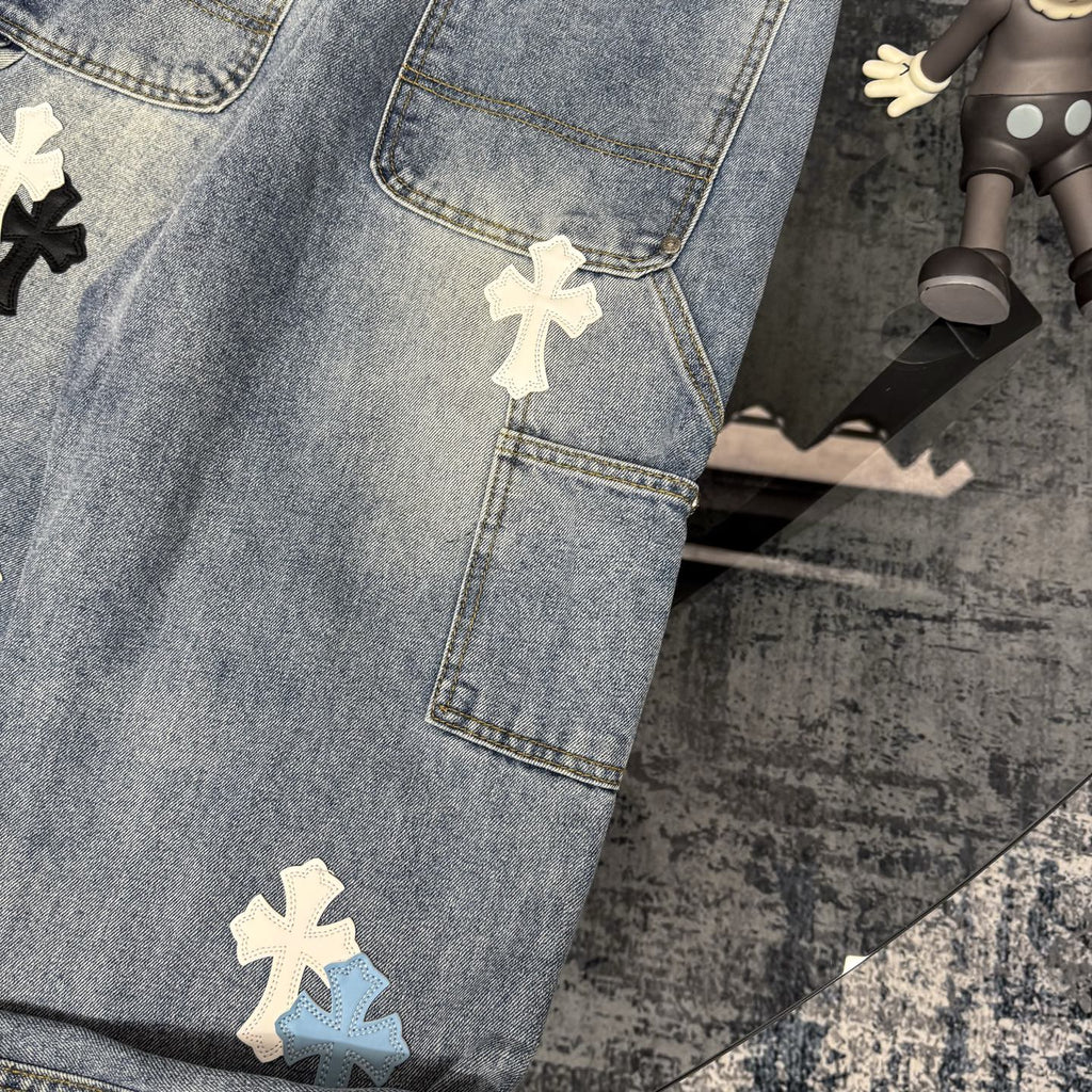 Denim Chrome pants with front patch pocket and cross-shaped applique