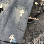 Denim Chrome pants with front patch pocket and cross-shaped applique