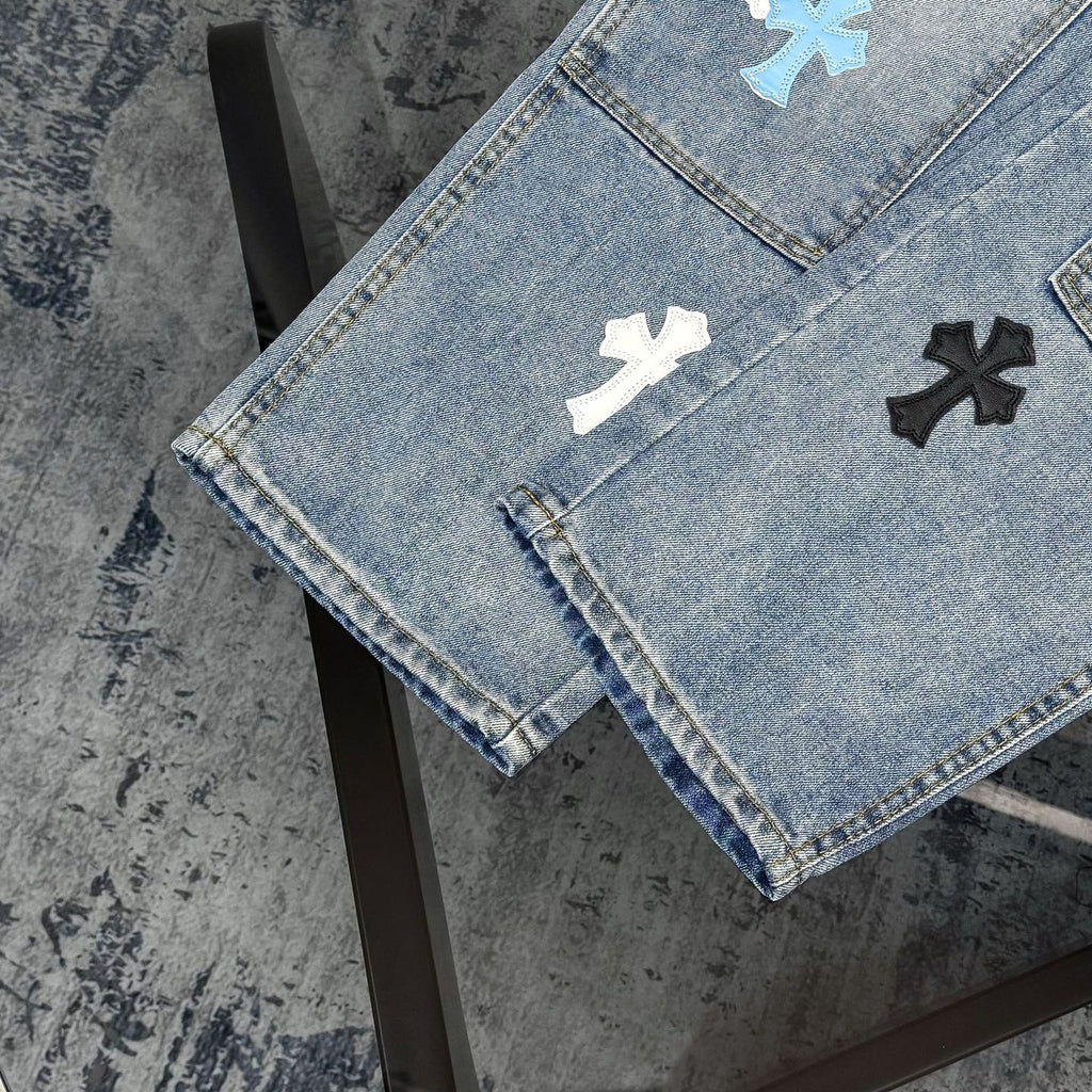 Denim Chrome pants hem with cross applique details