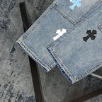 Denim Chrome pants hem with cross applique details