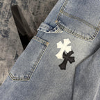 Denim Chrome pants leg with stitched seam and cross patch design