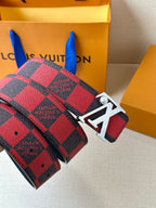 Louis Vuitton belt end and buckle: red-and-black check strap with silver clasp