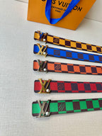Set of Louis Vuitton belts in colorful checker patterns with metal LV buckles