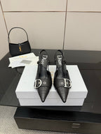 Black Dior slingback pumps, pointed toe, quilted leather, silver buckle strap