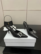 Black Dior slingback pumps, pointed toe, silver buckle, thin high heel