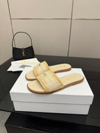 Women's slide sandals, cream strap with gold lettering and tan outsole