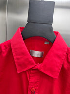 Red long-sleeve button-up shirt collar with interior label