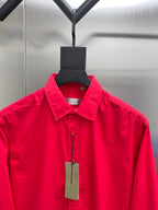 Red long-sleeve button-up shirt with pointed collar and front placket