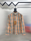 Burberry long-sleeve plaid shirt with button front, pointed collar, and beige tones