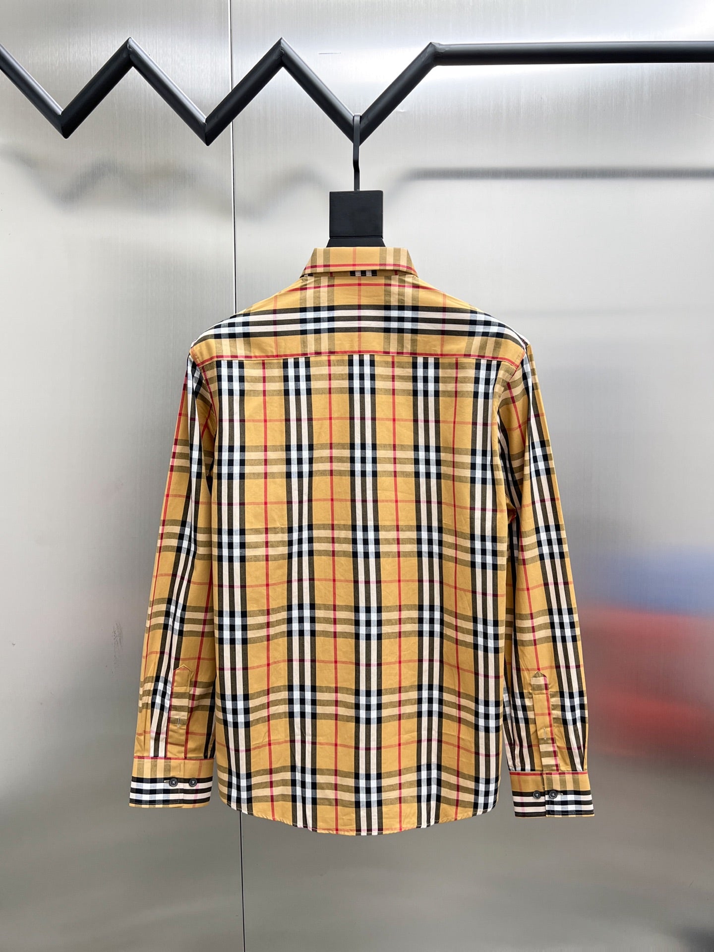 Burberry long-sleeve plaid shirt, back view with buttoned cuffs and collar