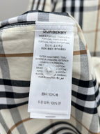 Burberry inner label on plaid long-sleeve shirt with cotton fabric info