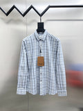 Burberry long-sleeve button-up shirt in light blue and white plaid, front view