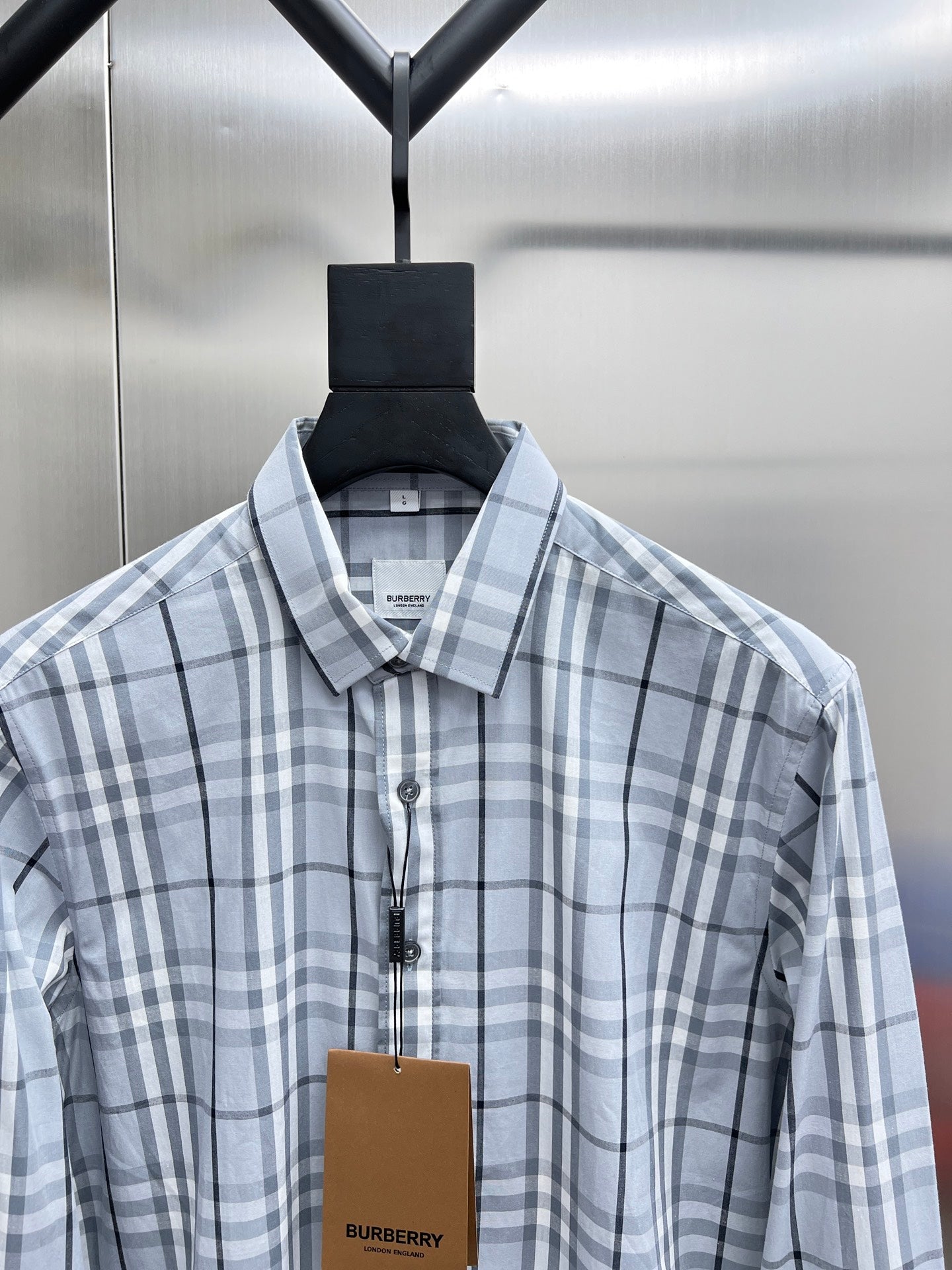 Burberry plaid dress shirt with point collar and button front, close-up front