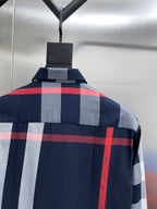 Long-sleeve shirt back with navy, gray, and red check pattern