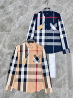 Burberry long-sleeve button-up shirt and another check shirt on hangers