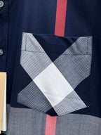 Burberry chest pocket with white and gray diamond check pattern on navy base