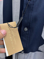 Burberry button-up placket with attached tag and navy/red/white check panels